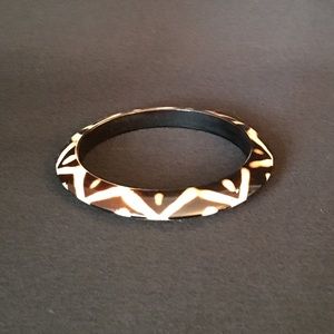 Brown, white plastic tribal bracelet